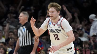 Associated Press - UConn guard Cam Spencer (12) celebrates after hitting a 3-pointer during the first half of the Sweet 16 college basketball game against San Diego State in the men's NCAA Tournament, Thursday, March 28, 2024, in Boston. (AP Photo/Michael Dwyer)