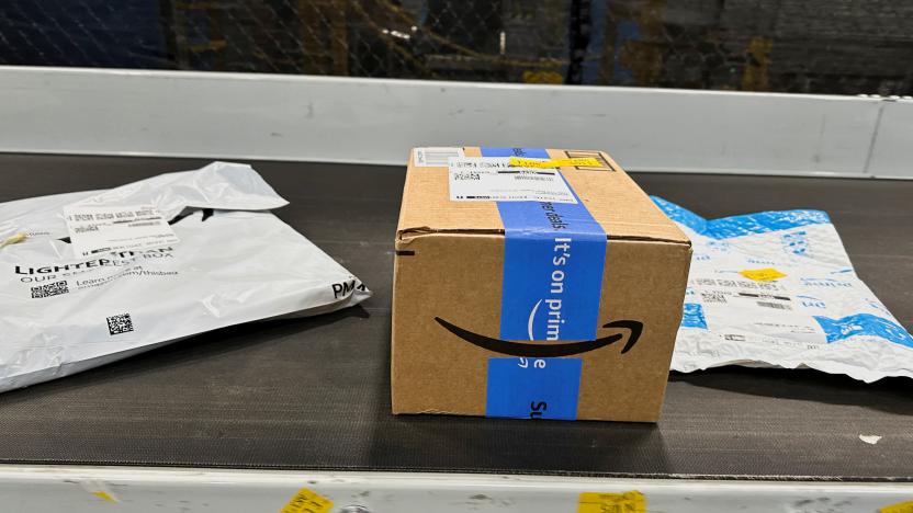 Packages are transported on a conveyor belt at the Amazon warehouse, busy on Prime Day, in Melville, New York, U.S., June 11, 2023. REUTERS/Soren Larson