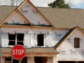 Homebuilder stocks close lower on weak housing starts data