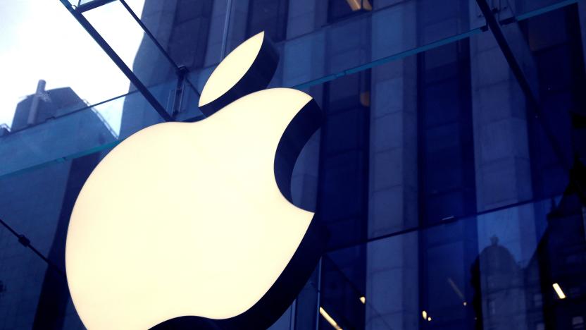 FILE PHOTO: The Apple Inc logo is seen hanging at the entrance to the Apple store on 5th Avenue in Manhattan, New York, U.S., October 16, 2019. REUTERS/Mike Segar/File Photo