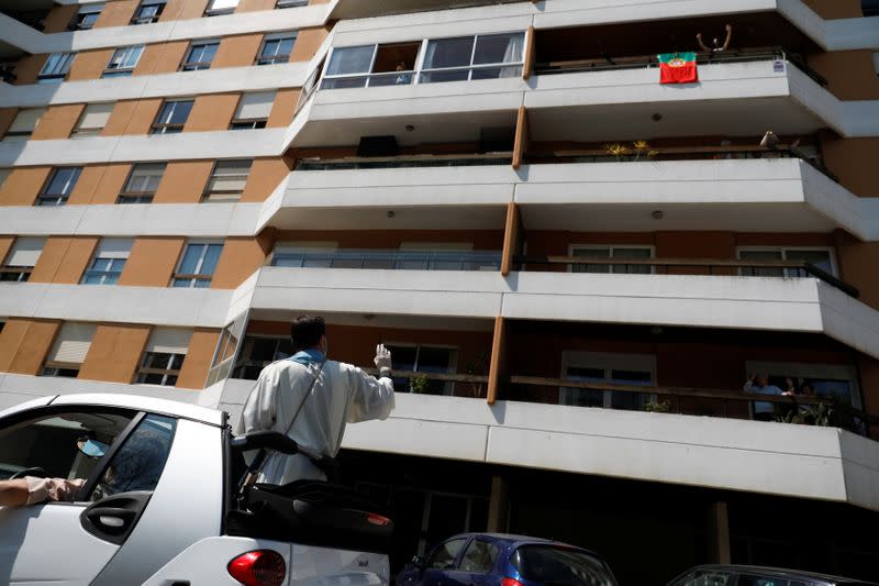 Portuguese priest celebrates Easter from convertible microcar