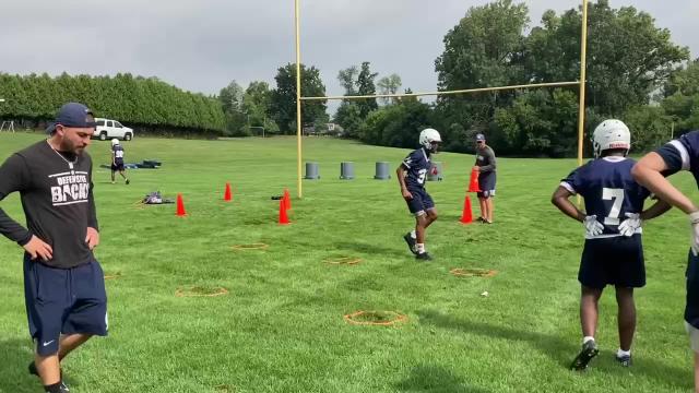 Watch as Okemos, East Lansing football open practice