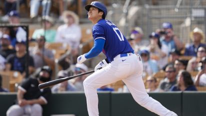 Associated Press - Los Angeles Dodgers designated hitter Shohei Ohtani reacts after hitting a home run during the fifth inning of a spring training baseball game against the Chicago White Sox in Phoenix, Tuesday, Feb. 27, 2024. Jose Ramos also scored. (AP Photo/Ashley Landis)