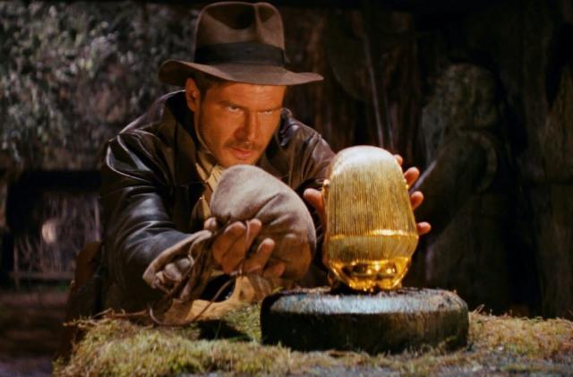 Indiana Jones prepares to swap a golden idol for a weighted bag in Raiders of the Lost Ark.