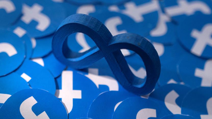 Meta and Facebook logos are seen in this illustration taken February 15, 2022. REUTERS/Dado Ruvic/Illustration