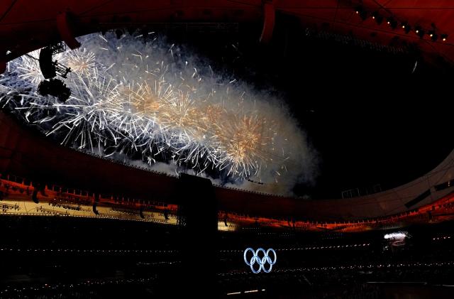 Feb 4, 2022; Beijing, CHINA;  Fireworks go off over the Opening Ceremony of the Beijing 2022 Winter Olympic Games at Beijing National Stadium.  Mandatory Credit: Harrison Hill-USA TODAY Sports