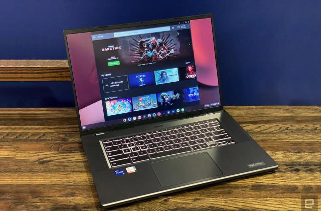 The Acer Chromeboko 516 GE  laptop seen open, facing the camera on a wooden desktop with a blue wall in the background.