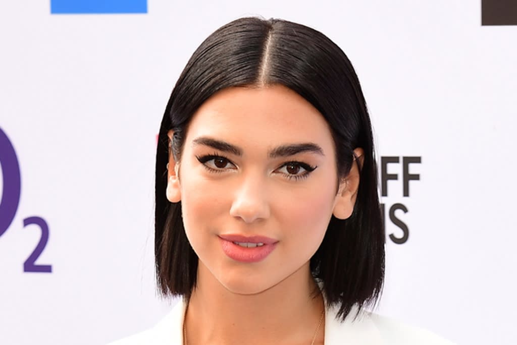 Dua Lipa Poses In Black Power Suit And Matching Pumps For New Ysl 