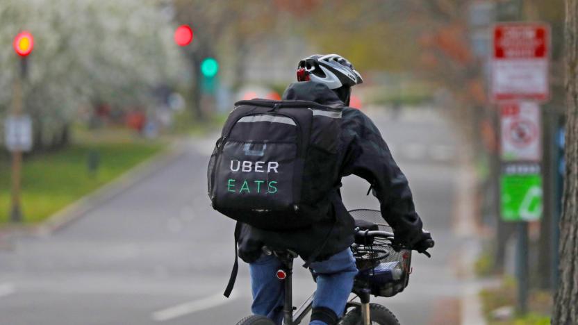 An Uber Eats bicyclist makes a delivery during the coronavirus outbreak, in the U.S. Capitol Hill neighborhood in Washington, U.S. April 1, 2020.  