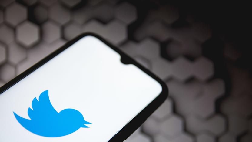 In this photo illustration a Twitter logo seen displayed on a smartphone screen with a computer wallpaper in the background in Athens, Greece on May 5, 2021. (Photo by Nikolas Kokovlis/NurPhoto via Getty Images)