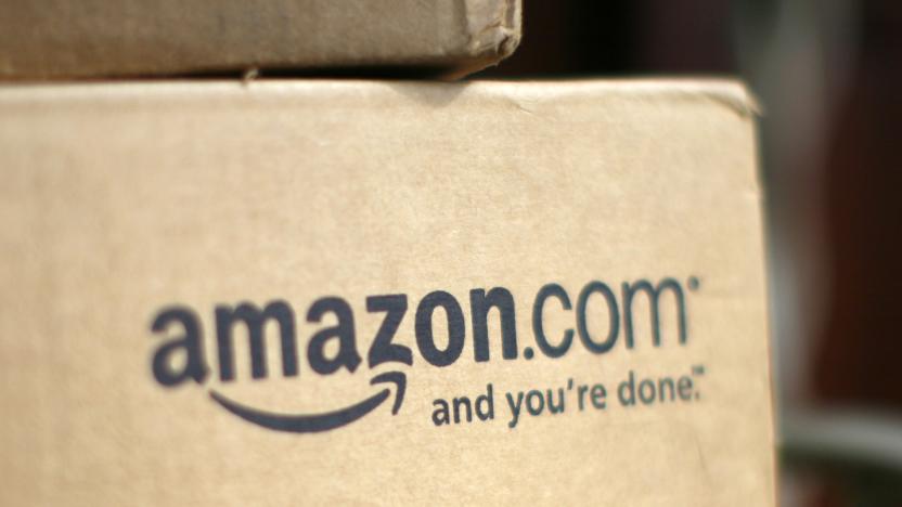 A box from Amazon.com is pictured on the porch of a house in Golden, Colorado July 23, 2008. Online retailer Amazon.com Inc said on Wednesday its quarterly profit doubled on a 41 percent rise in revenue, sending its shares up more than 6 percent.  REUTERS/Rick Wilking (UNITED STATES)