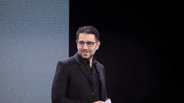 Microsoft's Chief Product Officer Panos Panay holds a Surface Duo at an event Wednesday, Oct. 2, 2019, in New York. (AP Photo/Mark Lennihan)