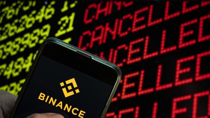 CHINA - 2021/04/24: In this photo illustration the cryptocurrency exchange trading platform Binance logo seen displayed on a smartphone with the word cancelled on a computer screen. (Photo Illustration by Budrul Chukrut/SOPA Images/LightRocket via Getty Images)