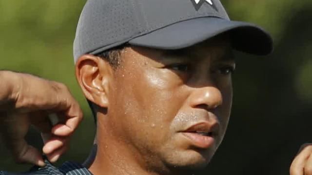 Tiger Woods goes 3-under before rain delay at PGA Championship