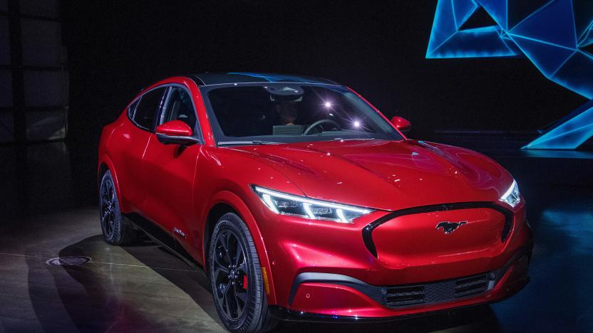 Ford reveals its first mass-market electric car the Mustang Mach-E, which is an all-electric vehicle that bears the name of the companys iconic muscle car at a ceremony in Hawthorne, California on November 17, 2019. - This is Ford's first serious attempt at making a long-range EV and will be the flagship of a new lineup that will include an electric F-150 pickup truck. (Photo by Mark RALSTON / AFP) (Photo by MARK RALSTON/AFP via Getty Images)