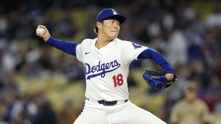 Associated Press - Los Angeles Dodgers pitcher Yoshinobu Yamamoto throws to the plate during the first inning of a baseball game against the San Diego Padres Friday, April 12, 2024, in Los Angeles. (AP Photo/Mark J. Terrill)