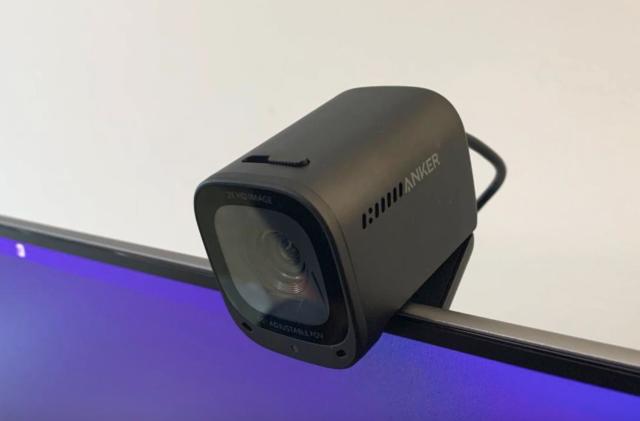 A webcam perched on a display. 