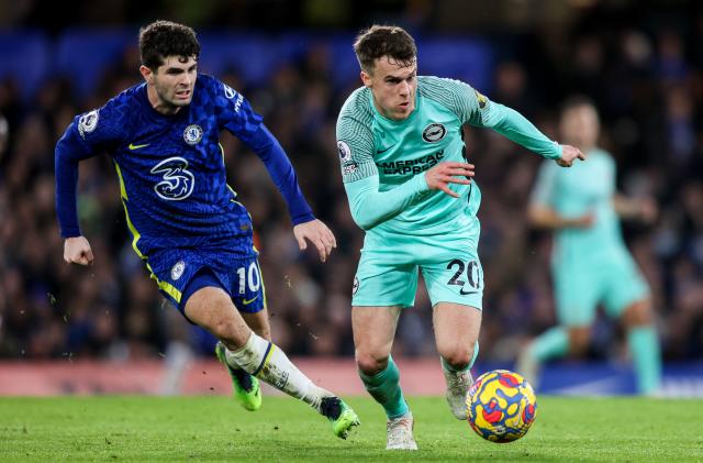 LONDON, ENGLAND - DECEMBER 29: Christian Pulisic of Chelsea gives chase to Solly March of Brighton & Hove Albion during the Premier League match between Chelsea  and  Brighton & Hove Albion at Stamford Bridge on December 29, 2021 in London, England. (Photo by Robin Jones/Getty Images)