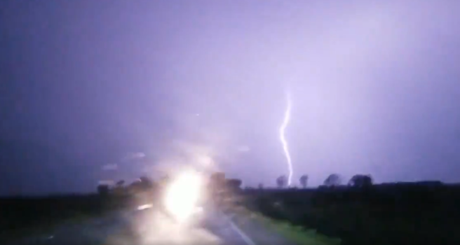 Multiple Lightning Strikes Seen During Nighttime Drive in Arkansas