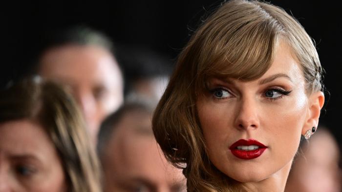 TOPSHOT - US singer-songwriter Taylor Swift arrives for the 66th Annual Grammy Awards at the Crypto.com Arena in Los Angeles on February 4, 2024. (Photo by Robyn BECK / AFP) (Photo by ROBYN BECK/AFP via Getty Images)