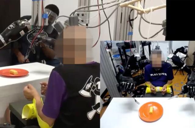 Robotic arms help a man with paralysis feed himself