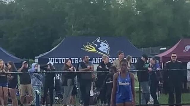 Webster Schroeder junior Camryn Cole high jumping 5 feet-3 inches.