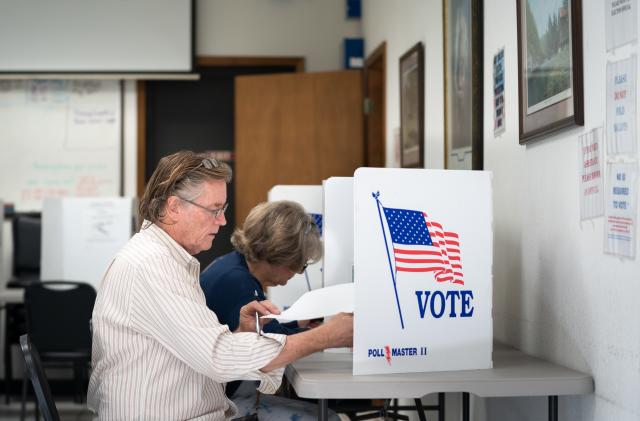 MT. GILEAD, NC - MAY 17: A man fills out a ballot at a voting booth on May 17, 2022 in Mt. Gilead, North Carolina. North Carolina is one of several states holding midterm primary elections. (Photo by Sean Rayford/Getty Images)