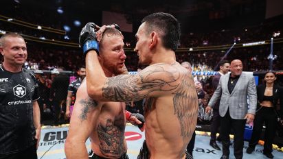 Yahoo Sports - Gaethje, battered and broken, seized the opportunity to meet Holloway in the center of the Octagon in the closing seconds of their BMF title fight — a testament to his resilience and