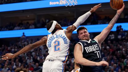Getty Images - DALLAS, TEXAS - MAY 13: Luka Doncic #77 of the Dallas Mavericks drives to the basket against Shai Gilgeous-Alexander #2 of the Oklahoma City Thunder during the first quarter in Game Four of the Western Conference Second Round Playoffs at American Airlines Center on May 13, 2024 in Dallas, Texas. NOTE TO USER: User expressly acknowledges and agrees that, by downloading and or using this photograph, User is consenting to the terms and conditions of the Getty Images License Agreement. (Photo by Tim Heitman/Getty Images)