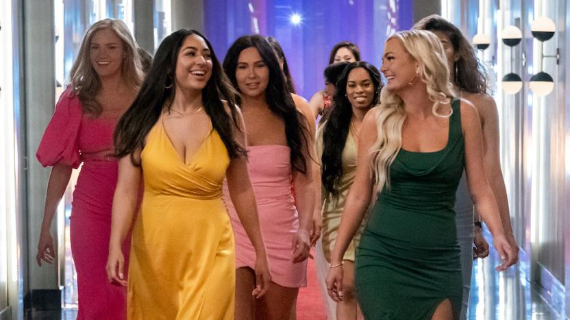 Women of Love is Blind Season 4 walk together down a hall. 