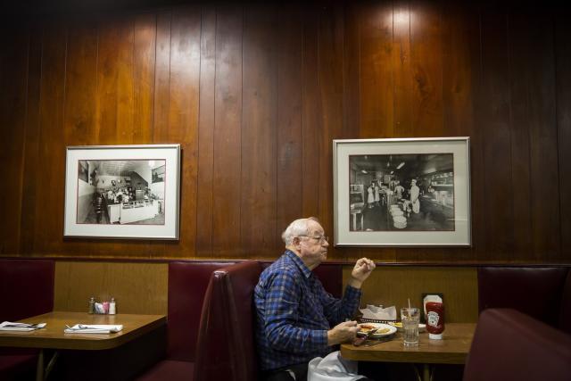 Bob Moore, a retiree who supported Donald Trump, eats at Cattlemen's Steakhouse Dec. 1 in Oklahoma City, Okla. (Photo: Eric Thayer for Yahoo News)