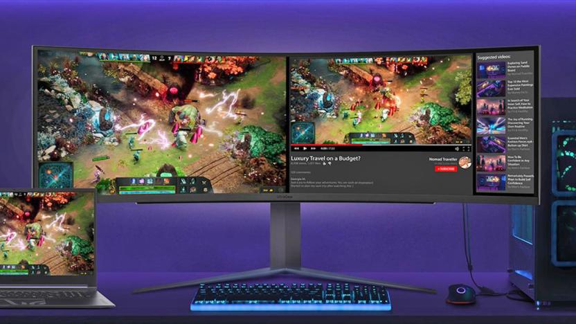 The LG 49GR85DC-B is a 49-inch monitor with a 240Hz refresh rate and DisplayHDR 1000 support, shown here on a desk next to a laptop and desktop PC.