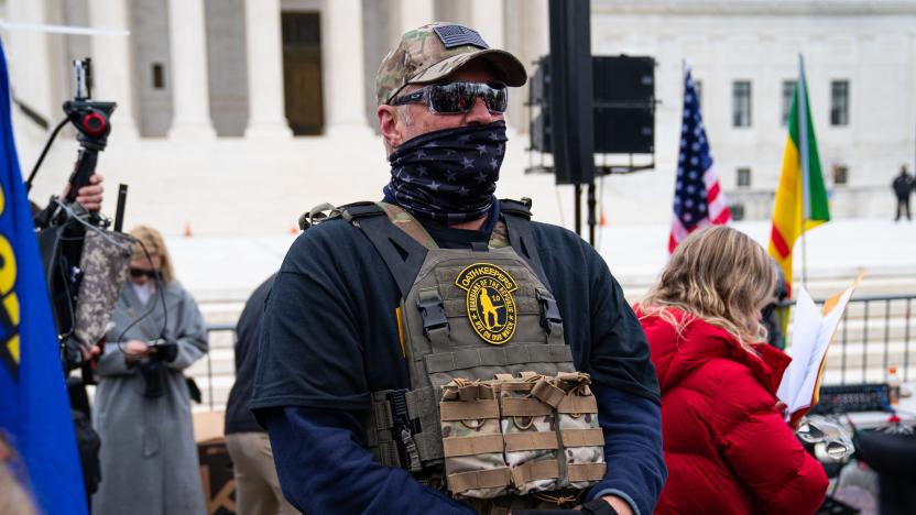 WASHINGTON, DC - JANUARY 05: A member of the right-wing group Oath Keepers stands guard during a rally in front of the U.S. Supreme Court Building on January 5, 2021 in Washington, DC. Today's rally kicks off two days of pro-Trump events fueled by President Trump's continued claims of election fraud and a last-ditch effort to overturn the results before Congress finalizes them on January 6.  (Photo by Robert Nickelsberg/Getty Images)