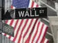 Stock market today: Wall Street holds steadier as oil prices pare their gains