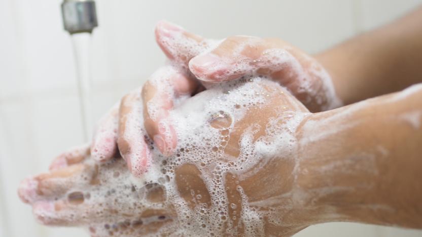 Close Up Of Medical Staff Washing Hands. Hand hygiene.