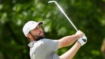 Scheffler working on putting before Charles Schwab