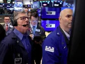 Dow sprints past 40,000-mark on earnings boost, rate-cut bets