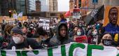 Demonstrators marched Monday in downtown Minneapolis as jury deliberations started in the murder trial of Derek Chauvin in the death of George Floyd. (The New York Times)