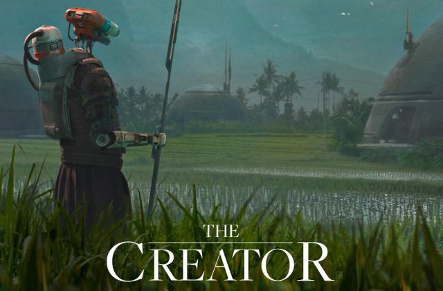 A promotional poster for the upcoming movie 'The Creator' showing a robot standing in a rice field with domed futuristic buildings in the distance.