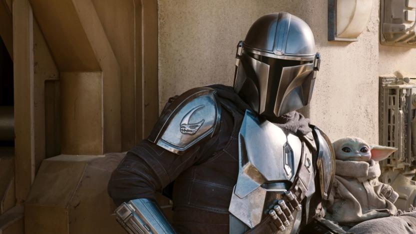 The Mandalorian (Pedro Pascal) and the Child in THE MANDALORIAN, season two, exclusively on Disney+