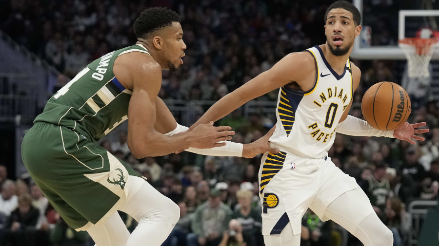 Getty Images - MILWAUKEE, WISCONSIN - JANUARY 01: Tyrese Haliburton #0 of the Indiana Pacers dribbles the ball against Giannis Antetokounmpo #34 of the Milwaukee Bucks during the second half at Fiserv Forum on January 01, 2024 in Milwaukee, Wisconsin. NOTE TO USER: User expressly acknowledges and agrees that, by downloading and or using this photograph, User is consenting to the terms and conditions of the Getty Images License Agreement (Photo by Patrick McDermott/Getty Images )