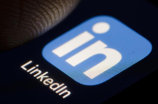 BERLIN, GERMANY - DECEMBER 14: The Logo of business and employment-oriented service LinkedIn is displayed on a smartphone on December 14, 2018 in Berlin, Germany. (Photo by Thomas Trutschel/Photothek via Getty Images)