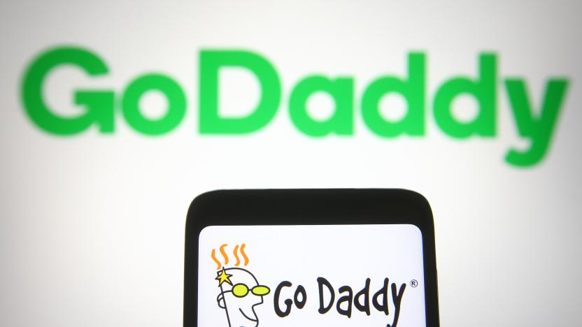 UKRAINE - 2021/04/07: In this photo illustration the GoDaddy logo is seen on a smartphone and a pc screen. (Photo Illustration by Pavlo Gonchar/SOPA Images/LightRocket via Getty Images)