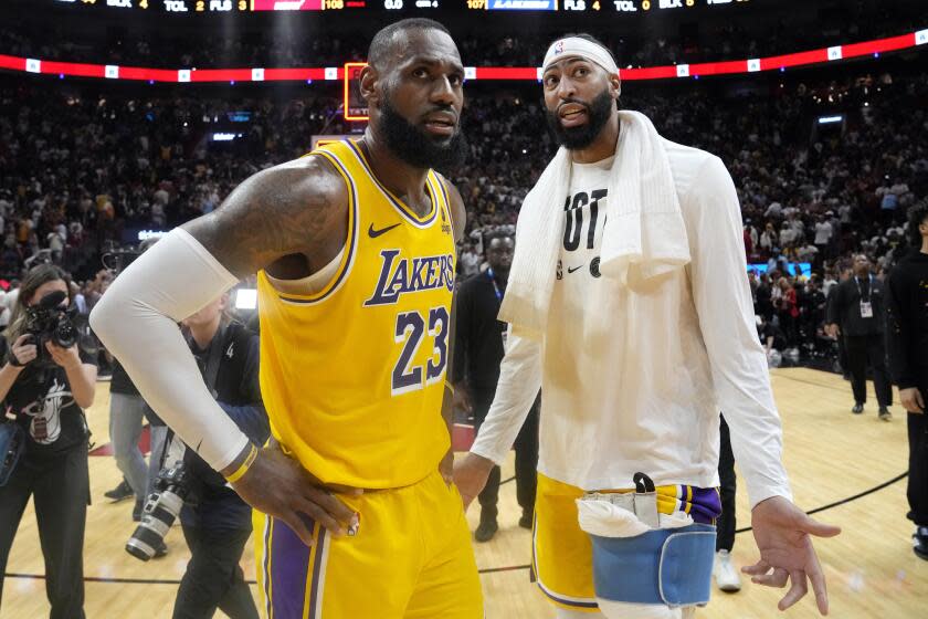 LeBron James and Anthony Davis to miss Celtics game amid Lakers' strife