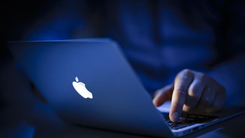 BERLIN, GERMANY - JUNE 22: In this photo Illustration the logo of Apple lights on an Apple Macbook Air on June 22, 2016 in Berlin, Germany. (Photo Illustration by Thomas Trutschel/Photothek via Getty Images)
