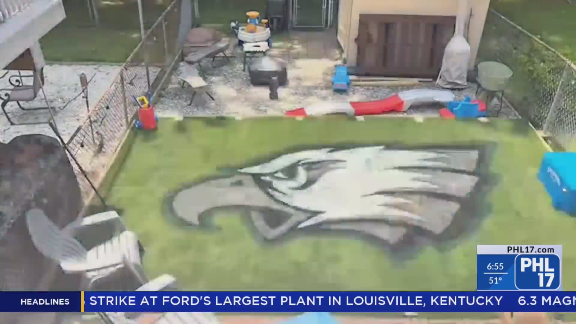 Philadelphia artist painting Eagles logos on fans' lawns - CBS Philadelphia