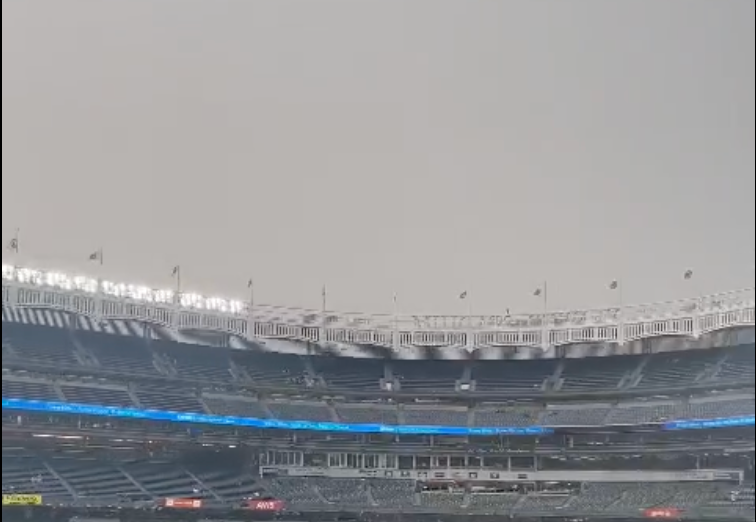 Fans at Yankee Stadium Watch Game in Haze of Smoke