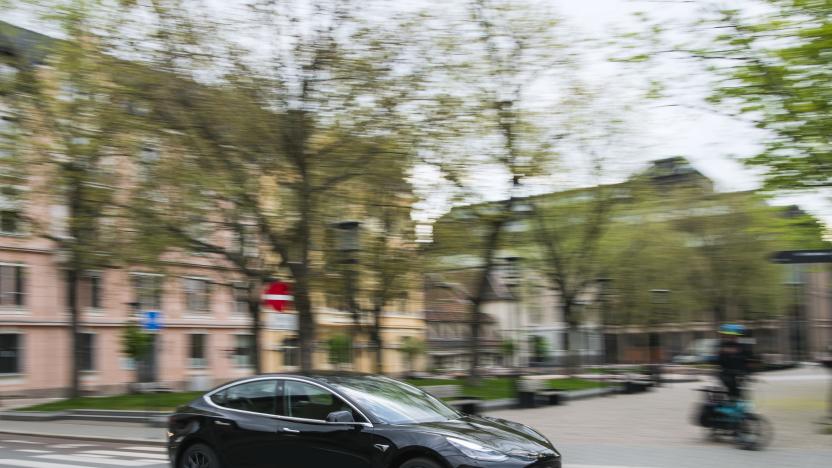 A Tesla Motors electric car drives on a street in the Norwegian capital Oslo on April 30, 2019. - Rich or not, young and old, hip urbanites and rural dwellers alike: Norwegians, including Crown Prince Haakon, are increasingly switching to electric cars. The choice is especially green in this country, where most of the electricity produced is environmentally-friendly, derived from hydro power. (Photo by Jonathan NACKSTRAND / AFP) (Photo by JONATHAN NACKSTRAND/AFP via Getty Images)