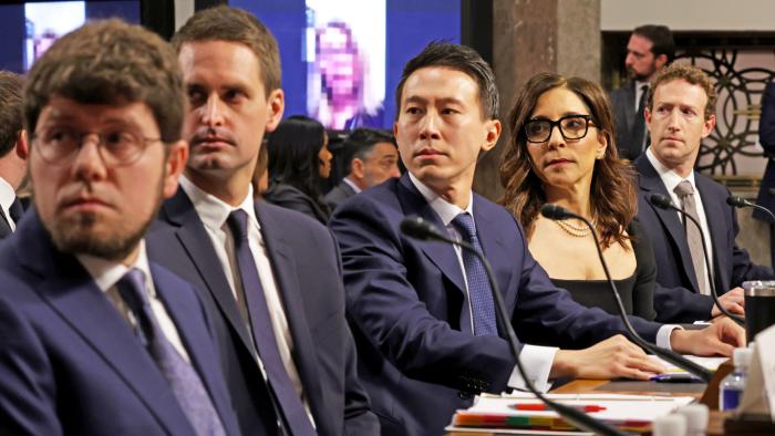 WASHINGTON, DC - JANUARY 31: (L-R) Jason Citron, CEO of Discord, Evan Spiegel, CEO of Snap, Shou Zi Chew, CEO of TikTok, Linda Yaccarino, CEO of X, and Mark Zuckerberg, CEO of Meta look on as they testify before the Senate Judiciary Committee at the Dirksen Senate Office Building on January 31, 2024 in Washington, DC. The committee heard testimony from the heads of the largest tech firms on the dangers of child sexual exploitation on social media. 