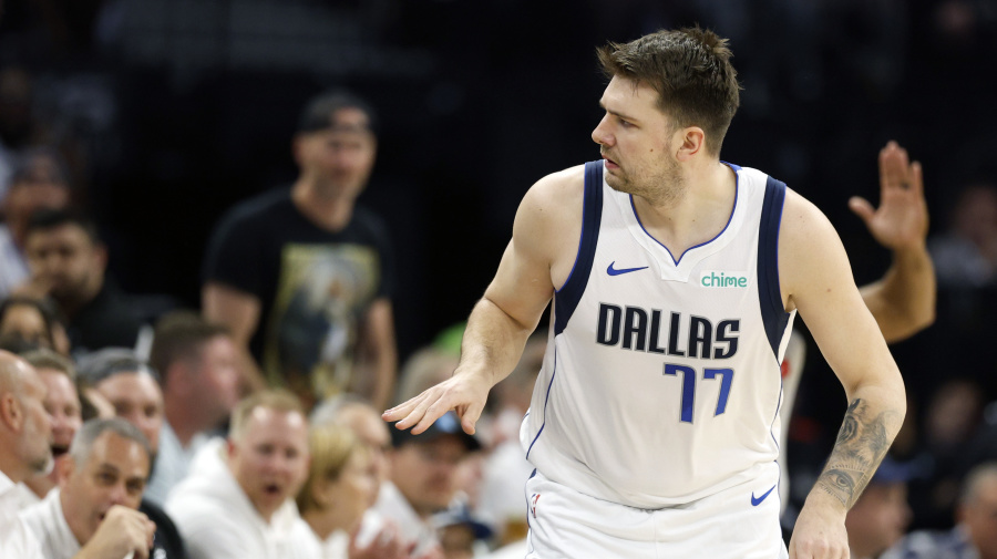 Getty Images - MINNEAPOLIS, MINNESOTA - MAY 30: Luka Doncic #77 of the Dallas Mavericks reacts after a basket during the first quarter against the Minnesota Timberwolves in Game Five of the Western Conference Finals at Target Center on May 30, 2024 in Minneapolis, Minnesota. NOTE TO USER: User expressly acknowledges and agrees that, by downloading and or using this photograph, User is consenting to the terms and conditions of the Getty Images License Agreement. (Photo by David Berding/Getty Images)